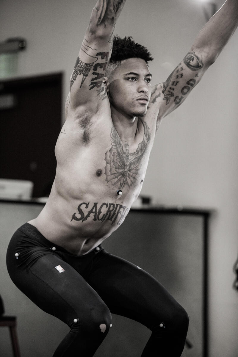 NBA athlete mid-jump during a P3 movement assessment