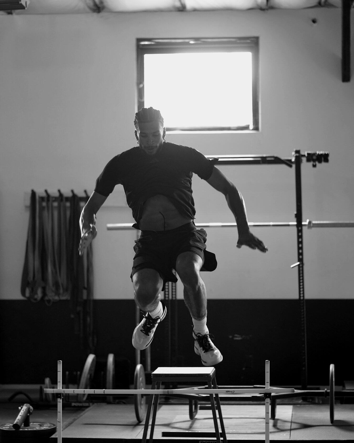 Athlete landing a hurdle hop during P3 training